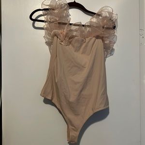 Free people XL pink ruffle body suit